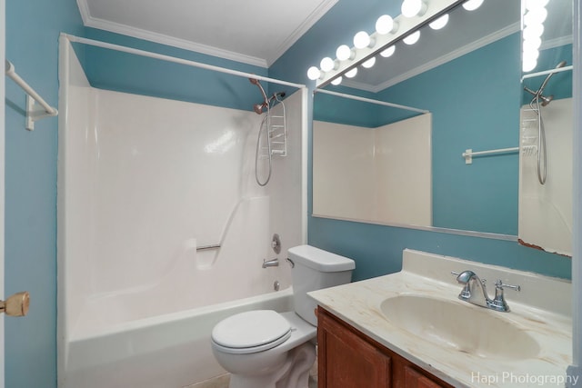 full bathroom featuring vanity, ornamental molding, toilet, and bathtub / shower combination