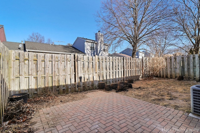 view of patio featuring central AC unit