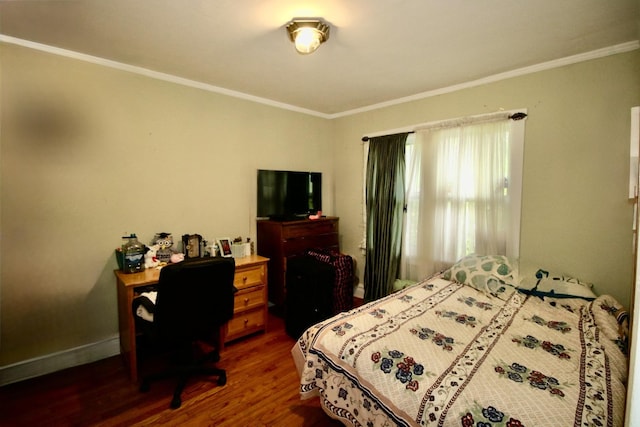 bedroom with baseboards, dark wood-style flooring, and ornamental molding