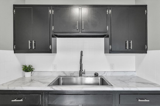 kitchen with sink and decorative backsplash