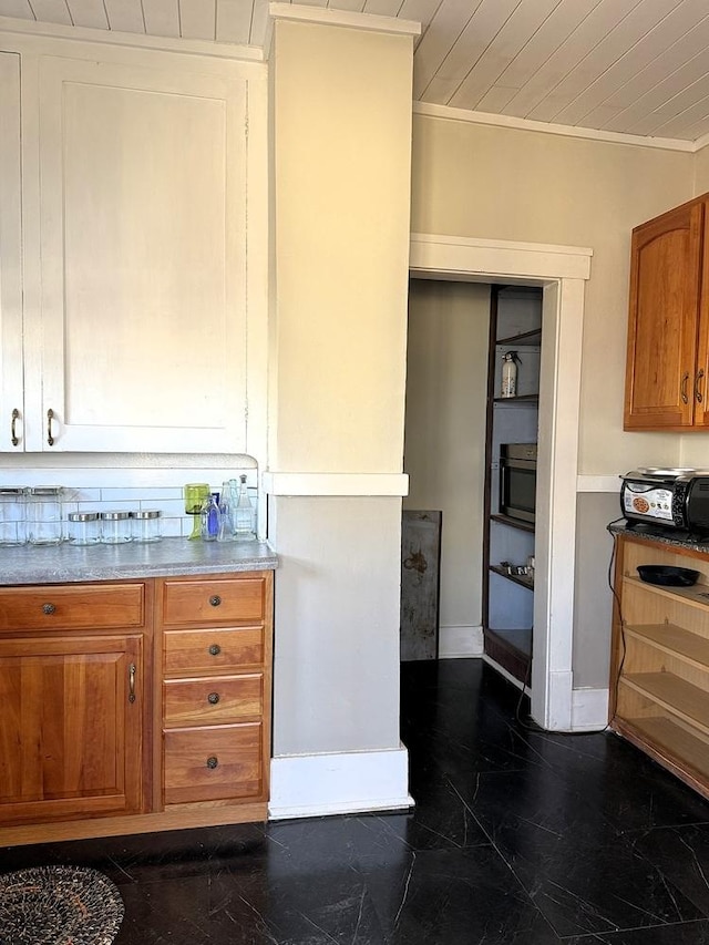 kitchen featuring wood ceiling and ornamental molding