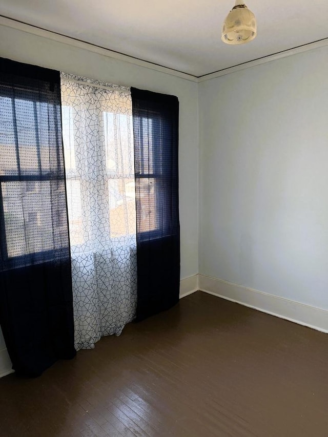 empty room with dark wood-type flooring