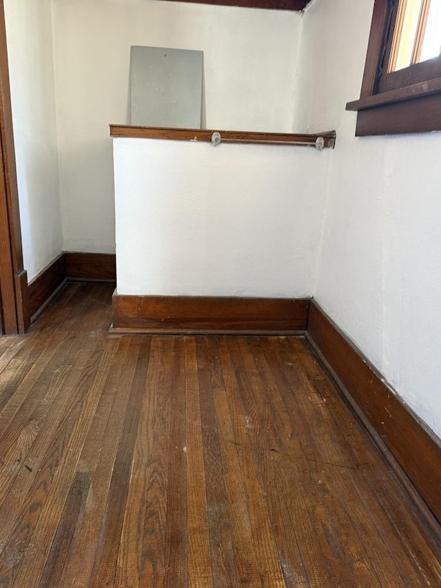 unfurnished room featuring dark hardwood / wood-style floors