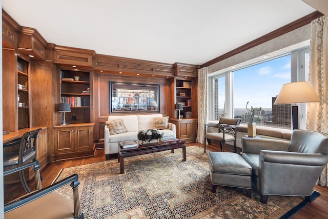 living room featuring crown molding and dark hardwood / wood-style flooring