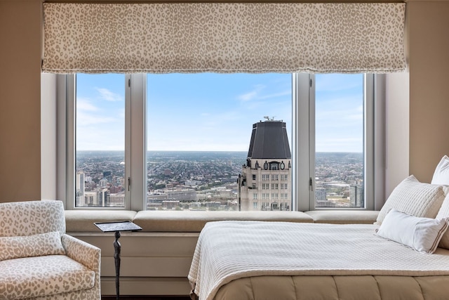 bedroom with multiple windows