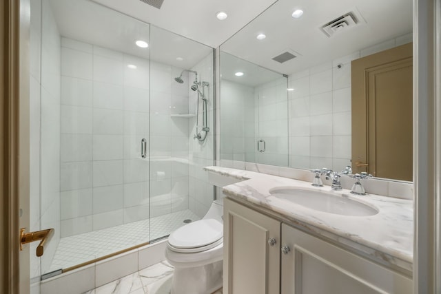 bathroom featuring vanity, tile walls, walk in shower, and toilet