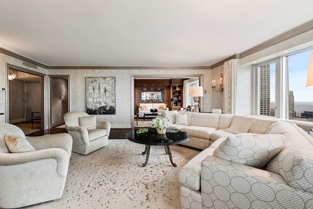 living room with ornamental molding and hardwood / wood-style floors