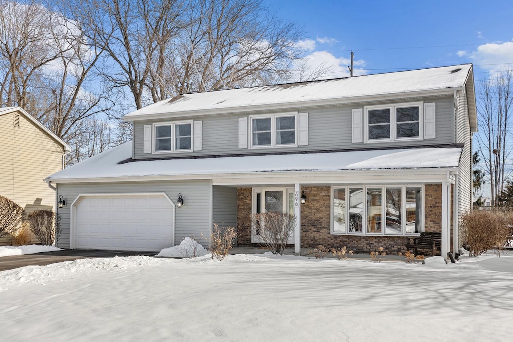 696 N Van Nortwick Ave, Batavia, IL 60510 - traditional home featuring brick siding