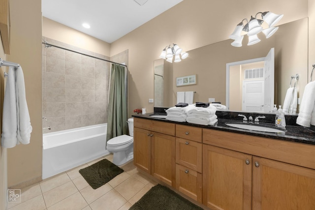 full bathroom featuring tile patterned flooring, shower / tub combo with curtain, vanity, and toilet