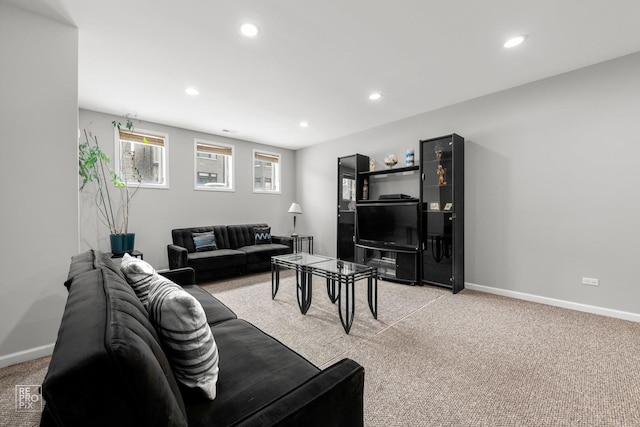 living room featuring light carpet, recessed lighting, and baseboards