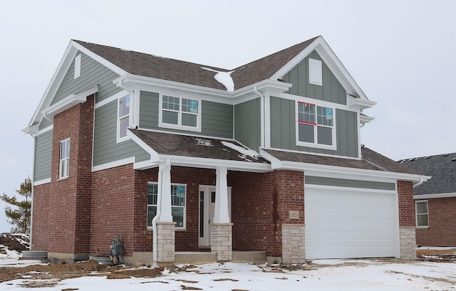 craftsman-style home with a garage