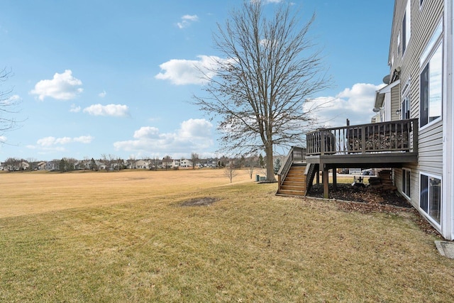 view of yard with a wooden deck