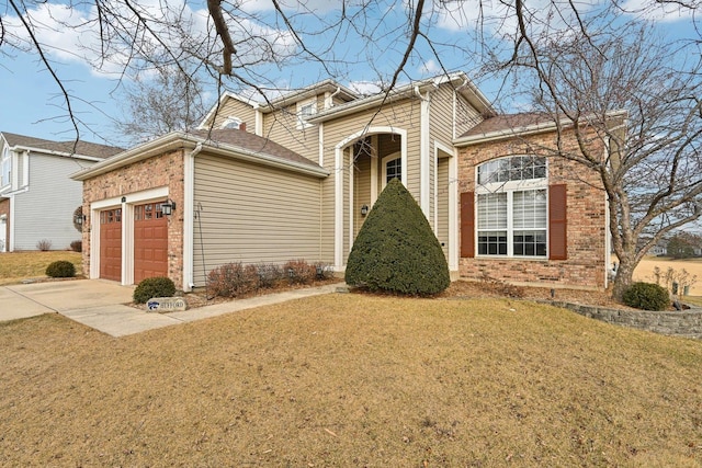 view of front facade with a front yard and a garage