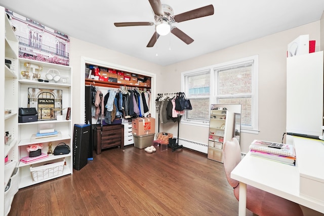 interior space featuring ceiling fan and baseboard heating