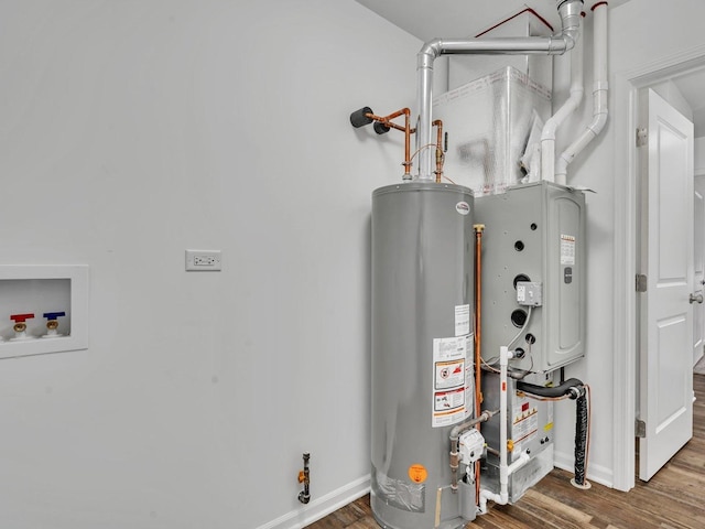 utility room with gas water heater