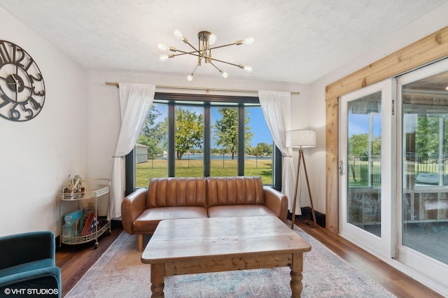 sunroom with a chandelier