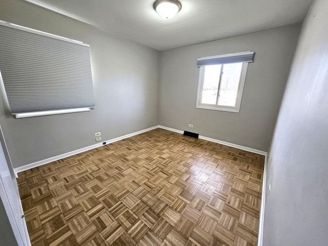 empty room with parquet floors