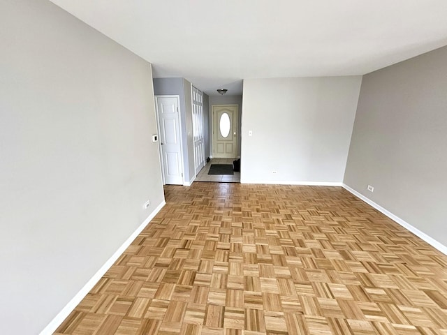 entrance foyer featuring light parquet floors