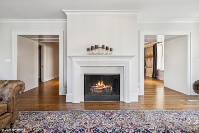 room details with hardwood / wood-style floors and ornamental molding