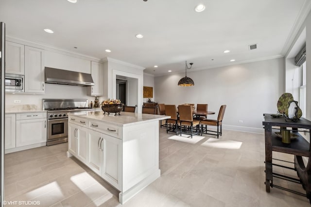 kitchen with white cabinetry, appliances with stainless steel finishes, range hood, and hanging light fixtures