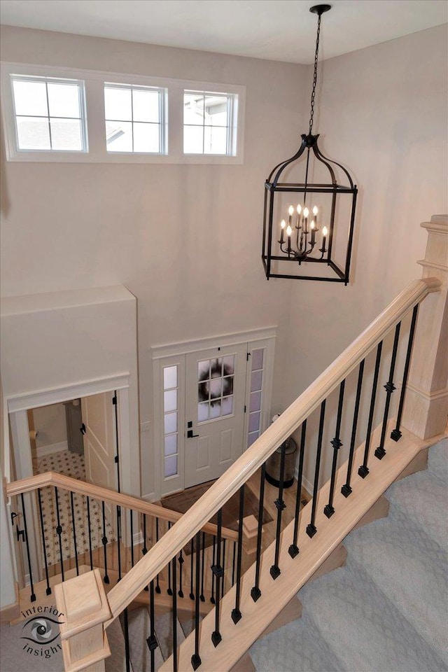 20375 Grosse Point Dr, Frankfort, IL 60423 - stairs with a chandelier and carpet flooring