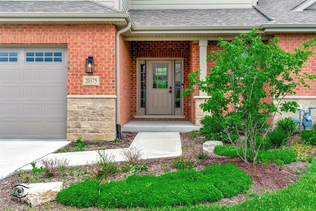 20375 Grosse Point Dr, Frankfort, IL 60423 - entrance to property featuring a shingled roof, brick siding, and an attached garage