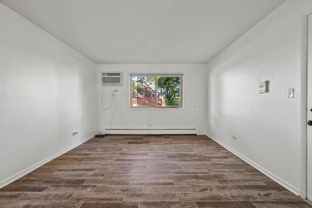 empty room with a wall mounted air conditioner, dark hardwood / wood-style floors, and a baseboard heating unit