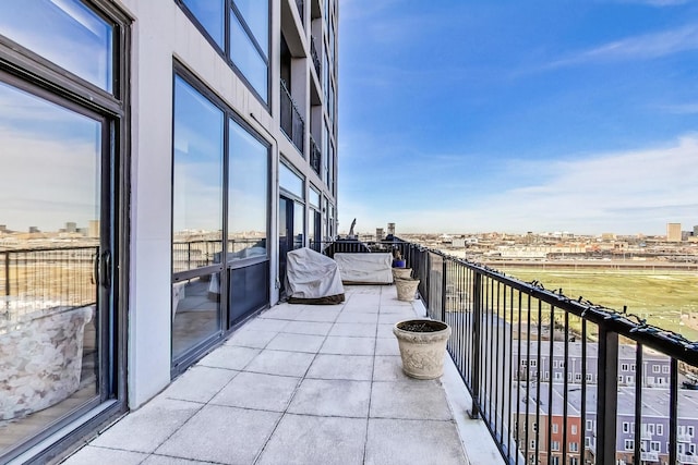 balcony featuring a city view