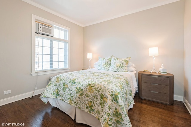 bedroom with dark wood-type flooring, crown molding, and a wall mounted AC