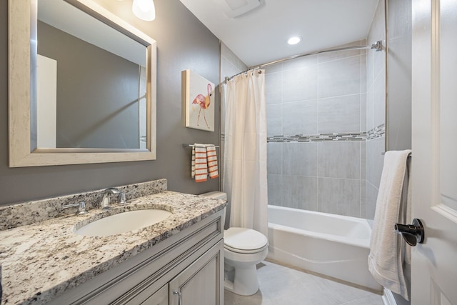 full bathroom featuring toilet, shower / bath combo, and vanity