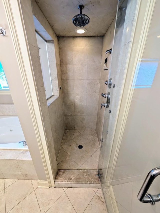 bathroom featuring plus walk in shower