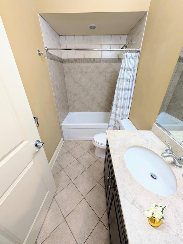 full bathroom featuring tile patterned flooring, vanity, shower / tub combo, and toilet