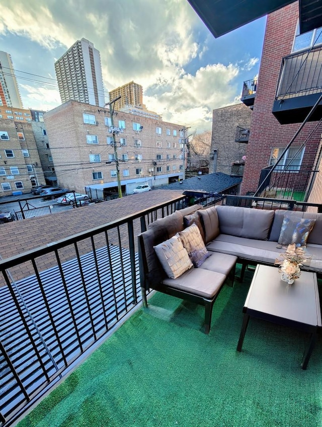 balcony featuring an outdoor hangout area