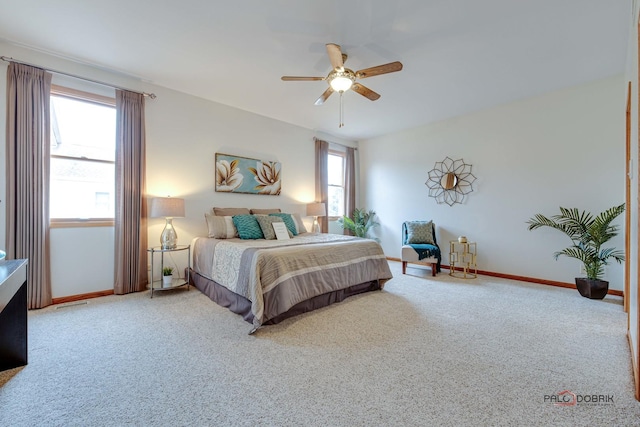 bedroom featuring ceiling fan and carpet floors