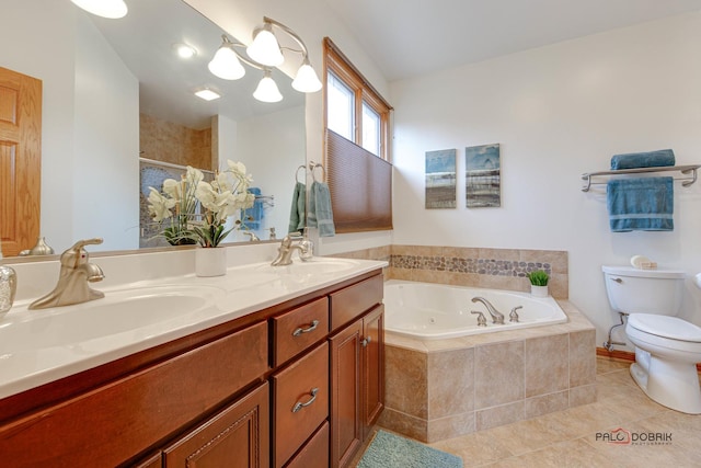 full bathroom featuring vanity, tile patterned floors, shower with separate bathtub, and toilet