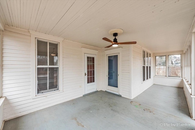 view of patio featuring ceiling fan