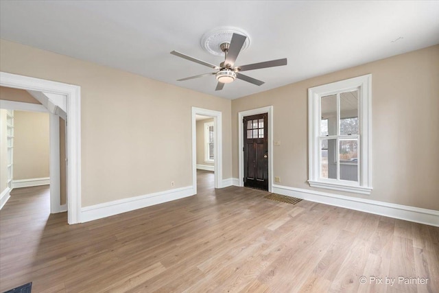 interior space featuring ceiling fan and light hardwood / wood-style flooring