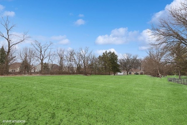 view of yard featuring fence