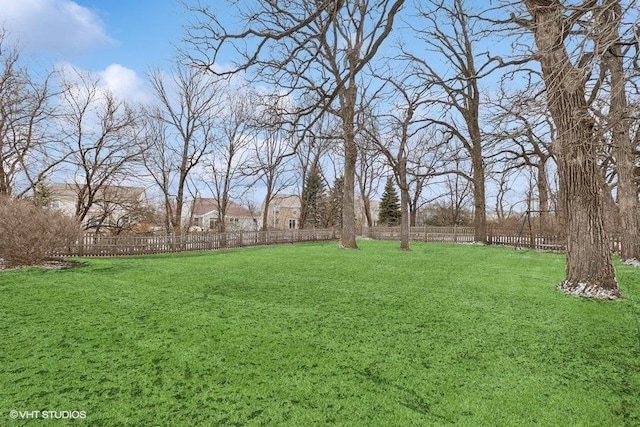 view of yard featuring fence