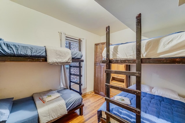 bedroom featuring hardwood / wood-style floors