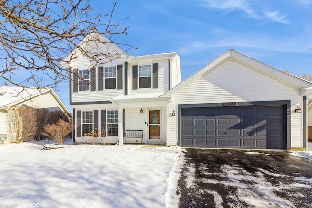 view of front of property featuring a garage