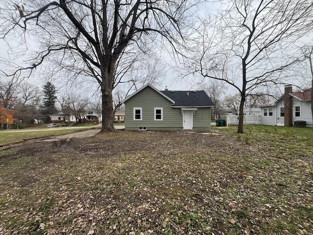 rear view of property featuring central air condition unit