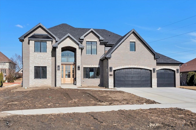 french country inspired facade with a garage