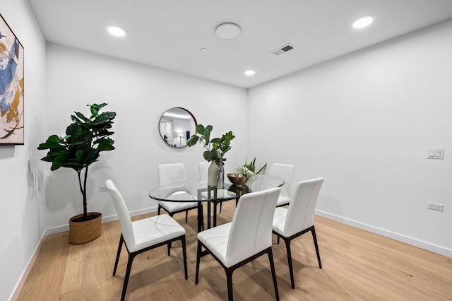 dining room with light wood-type flooring