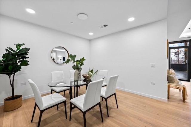 dining room featuring light hardwood / wood-style floors