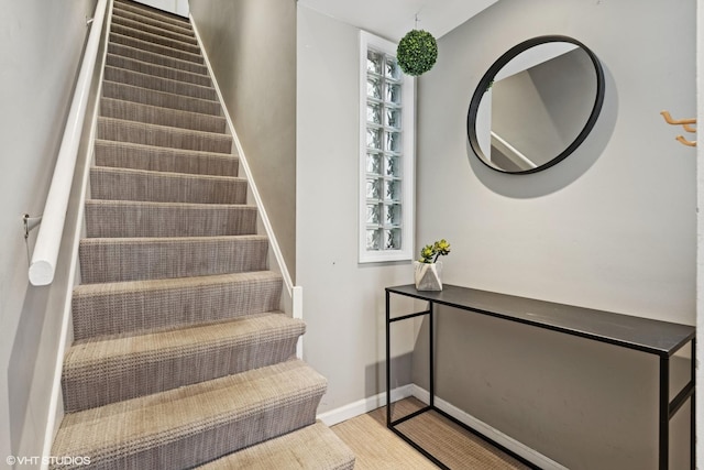 staircase with baseboards