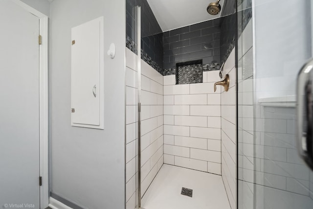 full bathroom featuring a shower stall