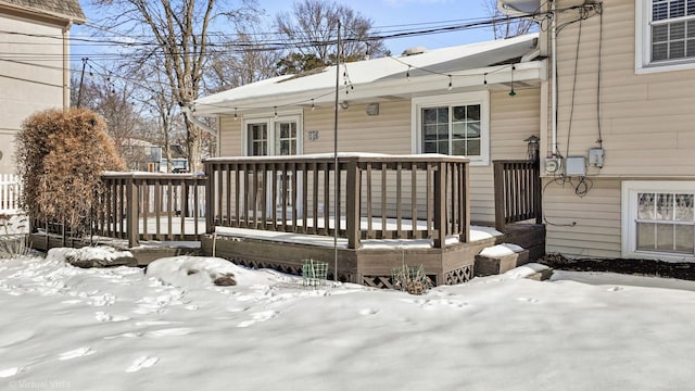 view of snow covered deck