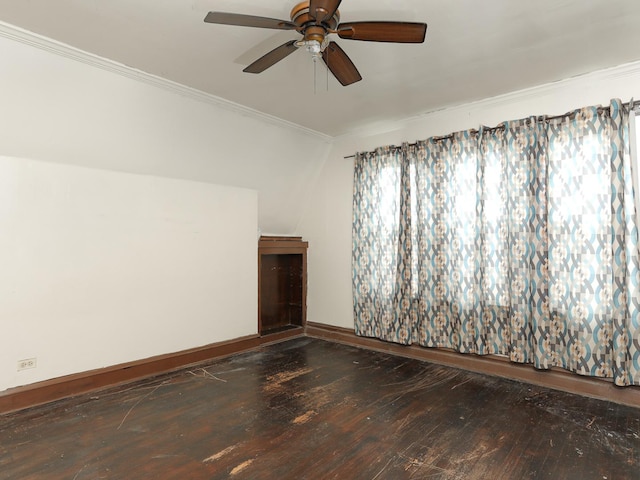 6333 S Talman Ave, Chicago, IL 60629 - spare room with crown molding, ceiling fan, and dark hardwood / wood-style flooring
