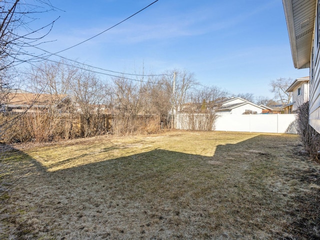 view of yard with fence